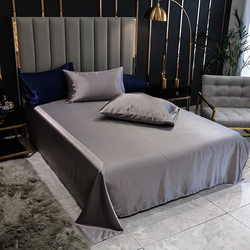 Aura Satin Thermal Regulating Sheet - Heat destroys cognitive recovery. Shield your rest with frictionless satin silk designed for elite temperature control. Maximize your biological ROI with absolute tactile silence. Optimize your baseline.