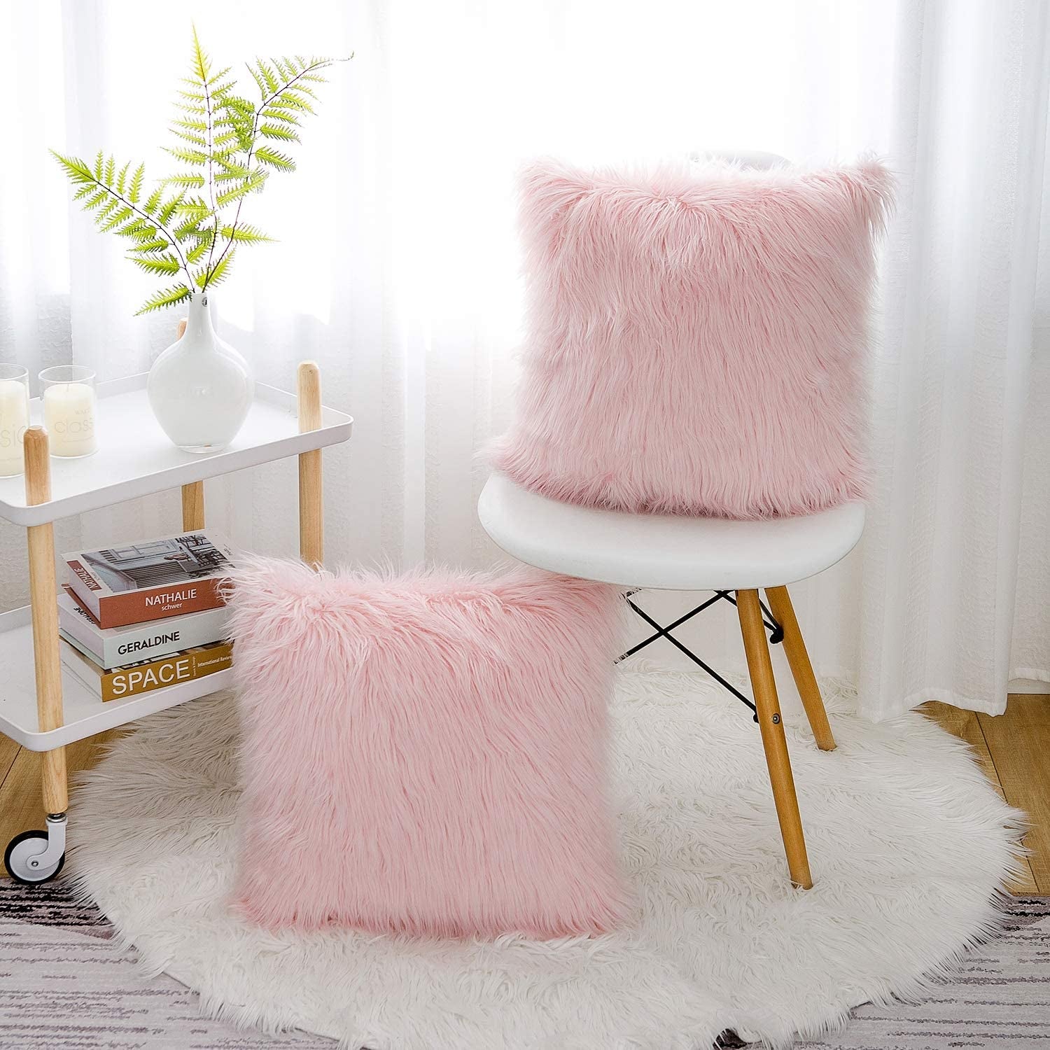 Blush Faux-Fur Sensory Duo - Modern chaos requires tactile countermeasures. Deploy these plush environmental anchors to soften rigid architecture and enforce cognitive rest. A dual-asset investment in spatial serenity and absolute comfort.