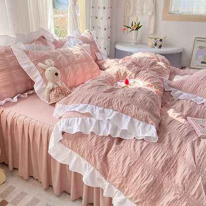 Dawn Aura 4-Piece Bedding Set - Sleep is your highest-yield biological asset. Shield your mind from digital exhaustion with this premium rose-hued quilt cover and bed skirt. Engineered for absolute cognitive recovery. Secure your sanctuary.