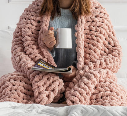Blush Chenille Gravity Throw - Reclaim tactile sovereignty with 3.7 lbs of weighted sensory isolation. A handcrafted, heavy-knit shield designed to ground the nervous system and absorb the friction of the modern digital landscape.
