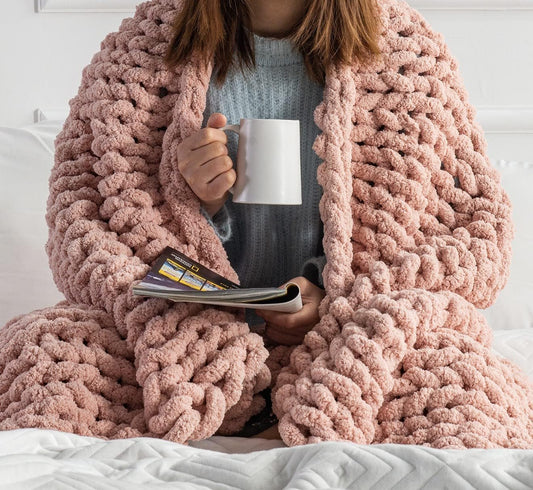 Blush Chenille Gravity Throw - Reclaim tactile sovereignty with 3.7 lbs of weighted sensory isolation. A handcrafted, heavy-knit shield designed to ground the nervous system and absorb the friction of the modern digital landscape.
