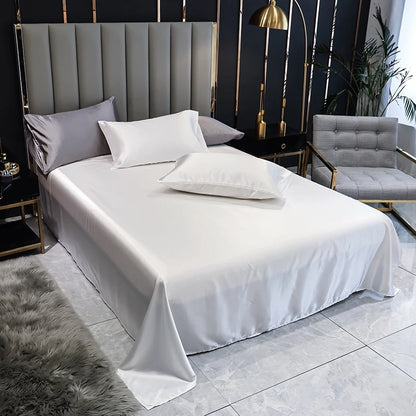 Aura Satin Thermal Regulating Sheet - Heat destroys cognitive recovery. Shield your rest with frictionless satin silk designed for elite temperature control. Maximize your biological ROI with absolute tactile silence. Optimize your baseline.
