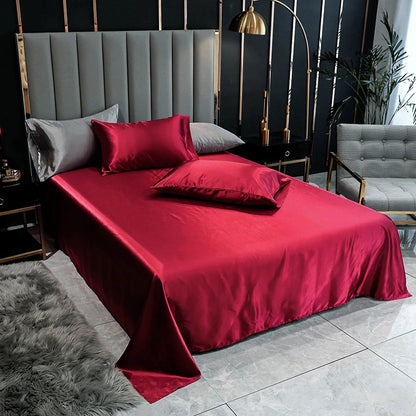 Aura Satin Thermal Regulating Sheet - Heat destroys cognitive recovery. Shield your rest with frictionless satin silk designed for elite temperature control. Maximize your biological ROI with absolute tactile silence. Optimize your baseline.